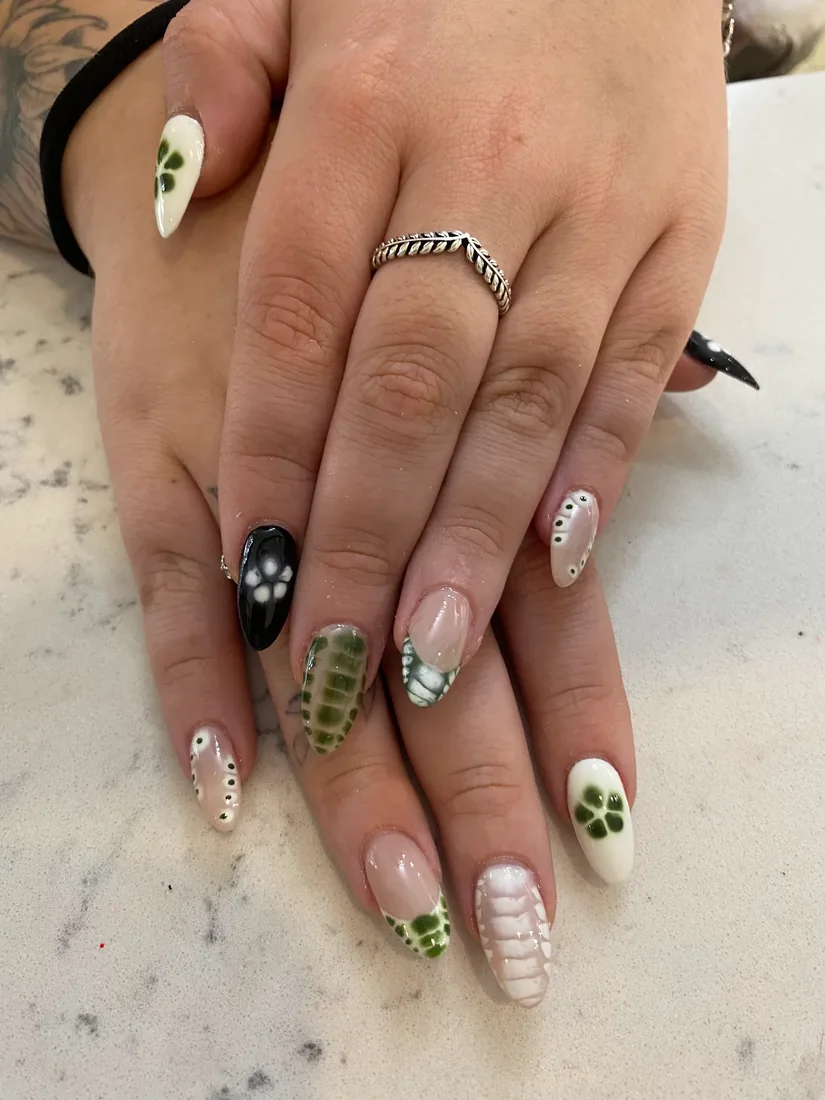 Detailed green and neutral nail art